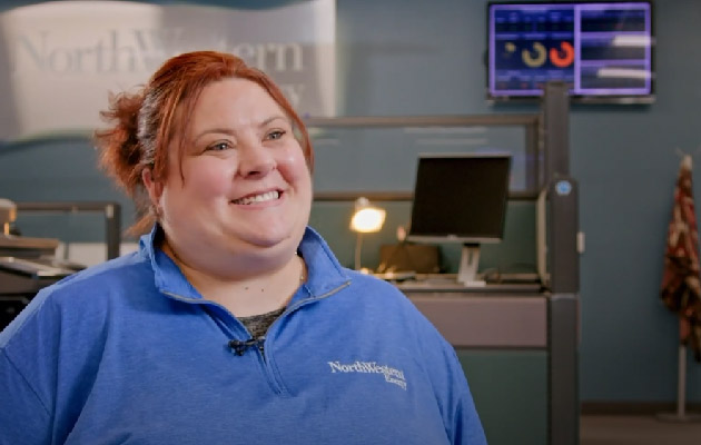 A screen shot from a scam warning video shows a smiling Customer Service Representative in our call center